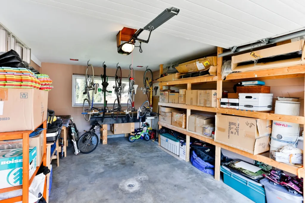 Current image: Edmonton homeowner clearing clutter during a garage cleanout