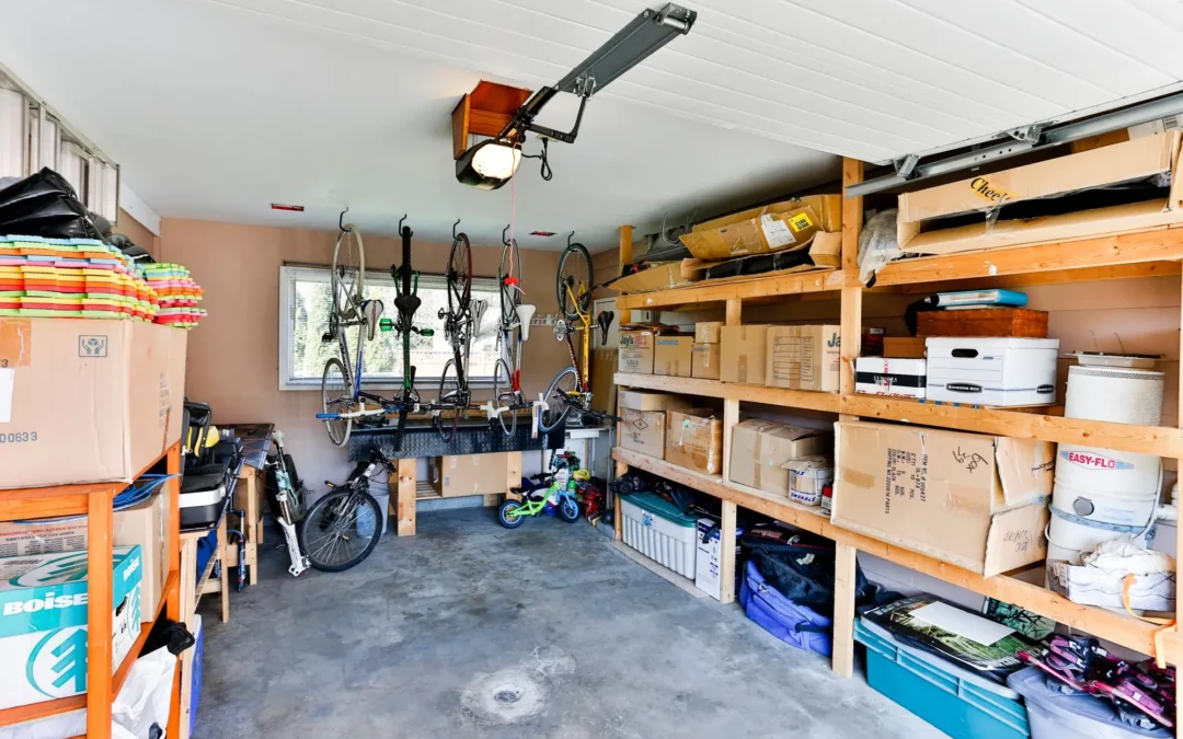 Edmonton homeowner clearing clutter during a garage cleanout