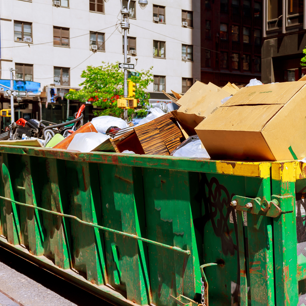 junk removal crew loading furniture and debris in Edmonton